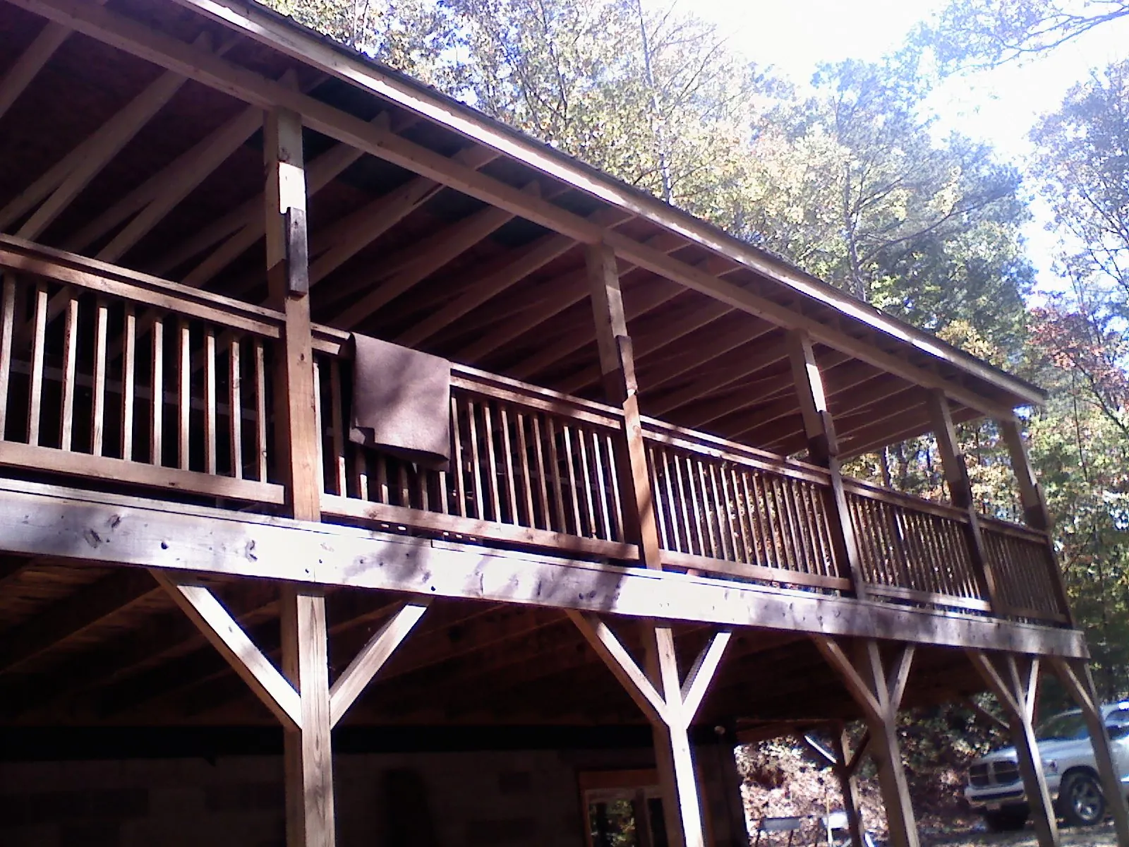 Timber framing under a new elevated porch and deck — Roof Leak Repair in Tarrytown by Roofing Brothers